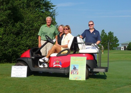 Andi & Marty Korte's team, posed on the Ryder Cup cart.